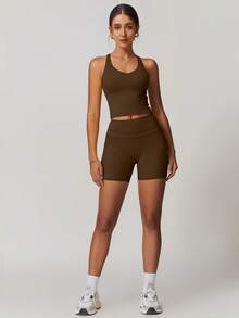 NcmRyu Women's One Set Solid Color U-Neck Padded Criss-Cross Back Sports Bra And Tight Shorts Activewear Set - Chocolate Brown - View 5