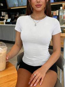 Camiseta de mujer de cuello redondo y manga corta, nueva moda de verano de unicolor, top casual ajustado y corto - Blanco - Ver 1