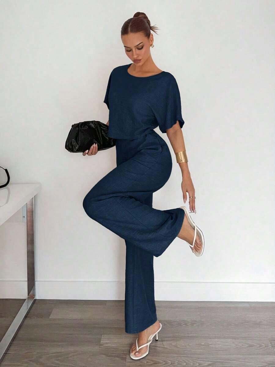 Conjunto casual elegante de dos piezas para mujer, compuesto por blusa corta de manga corta de cuello redondo y pantalones wide leg plisados holgados de color sólido a juego.Tela fresca texturizada cómoda, estilo relajado versátil, ideal para uso diario y salidas informales. - Azul marino - Ver 1