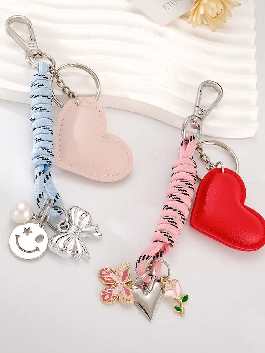 1 chiếc móc khóa túi hình trái tim thời trang với mặt dây chuyền hình nơ cười và hoa hồng. - Nhiều màu - Xem 1