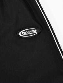 Bộ đồ nữ màu đen phong cách đường phố thường ngày, gồm áo croptop và quần ống rộng in hình môi. - màu đen - Xem 8