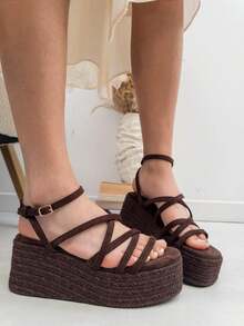 VIKIVIKI SHOES Women's Platform Espadrille-Style Sandals With A Crisscrossing Strap Design And Ankle Strap. This Summer Style Features A Raised Platform Made Of Braided Jute, Providing Comfortable Height And A Streamlined Silhouette. The Lightweight Construction Ensures A Perfect Fit With A Side Closure, Making Them Ideal For Everyday Wear. Their Modern, Minimalist Aesthetic Is Perfect For Vacations, The Beach, And Strolls. They Pair Beautifully With Dresses, Skirts, And Casual Chic Outfits For A Fresh And Elegant Feminine Look. - Quán cà phê - Xem 6