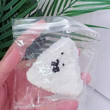 畅销芝麻三角饭团慢回弹软硅胶玩具，缓解压力，逼真饭团造型 - 彩色 - 查看 11