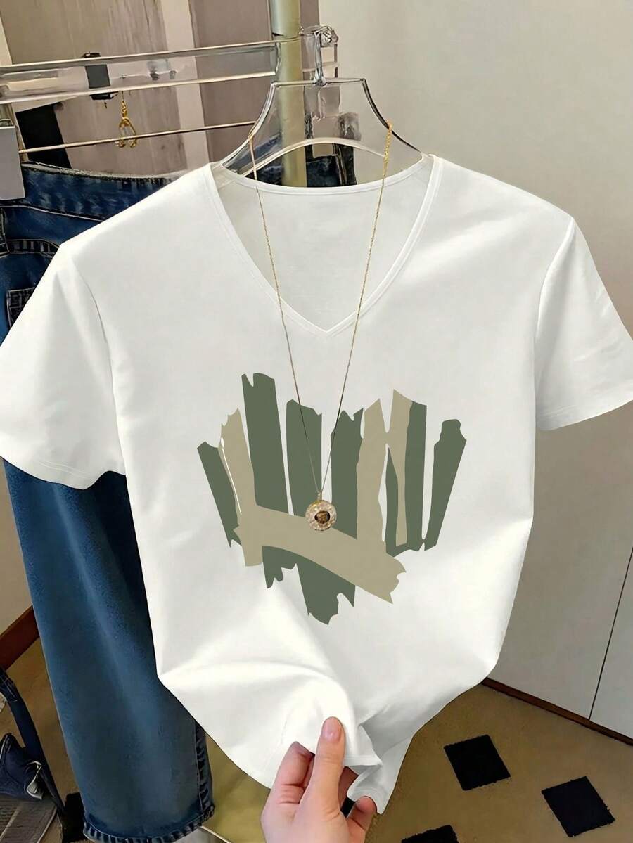 Camiseta de mujer de manga corta con cuello en V y estampado de corazón graffiti, top casual de ajuste holgado y estilizador de verano en color blanco - Blanco - Ver 1