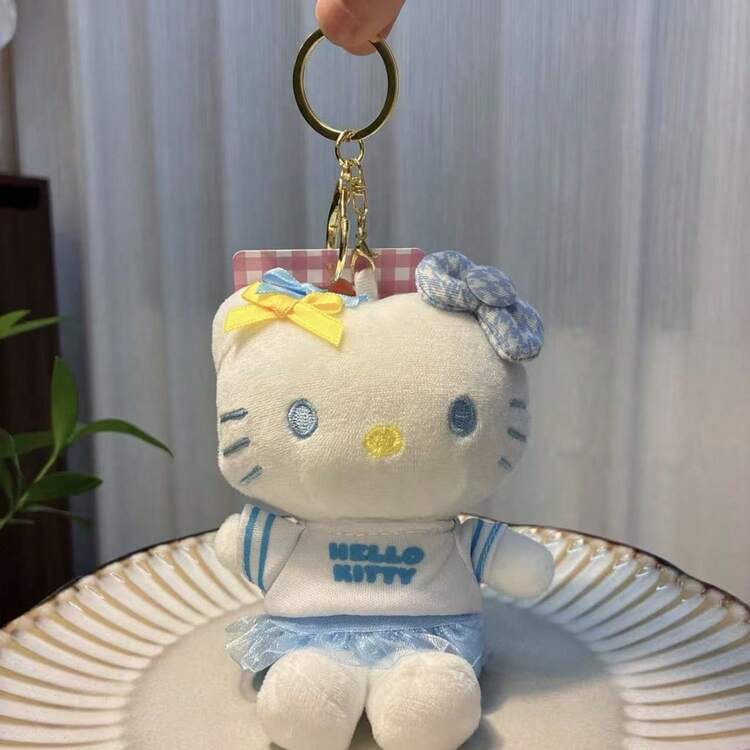 1 chiếc móc khóa túi hình Hello Kitty mặc đồng phục học sinh màu hồng, xanh dương, đen và trắng của Sanrio, quà tặng búp bê nhồi bông hình mèo. - Nhiều màu - Xem 9