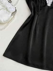 Vestido mini ajustado de línea A con escote en V profundo, sin mangas y espalda descubierta, de moda y casual, apto para primavera temprana, otoño e invierno. Adecuado para vacaciones, Día de San Valentín y citas - Negro - Ver 6