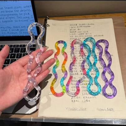 1根多色渐变扭曲变形绳，随温度变化。可按摩放松肌肉和手指，家居装饰有助于营造氛围，缓解压力，舒缓身心。