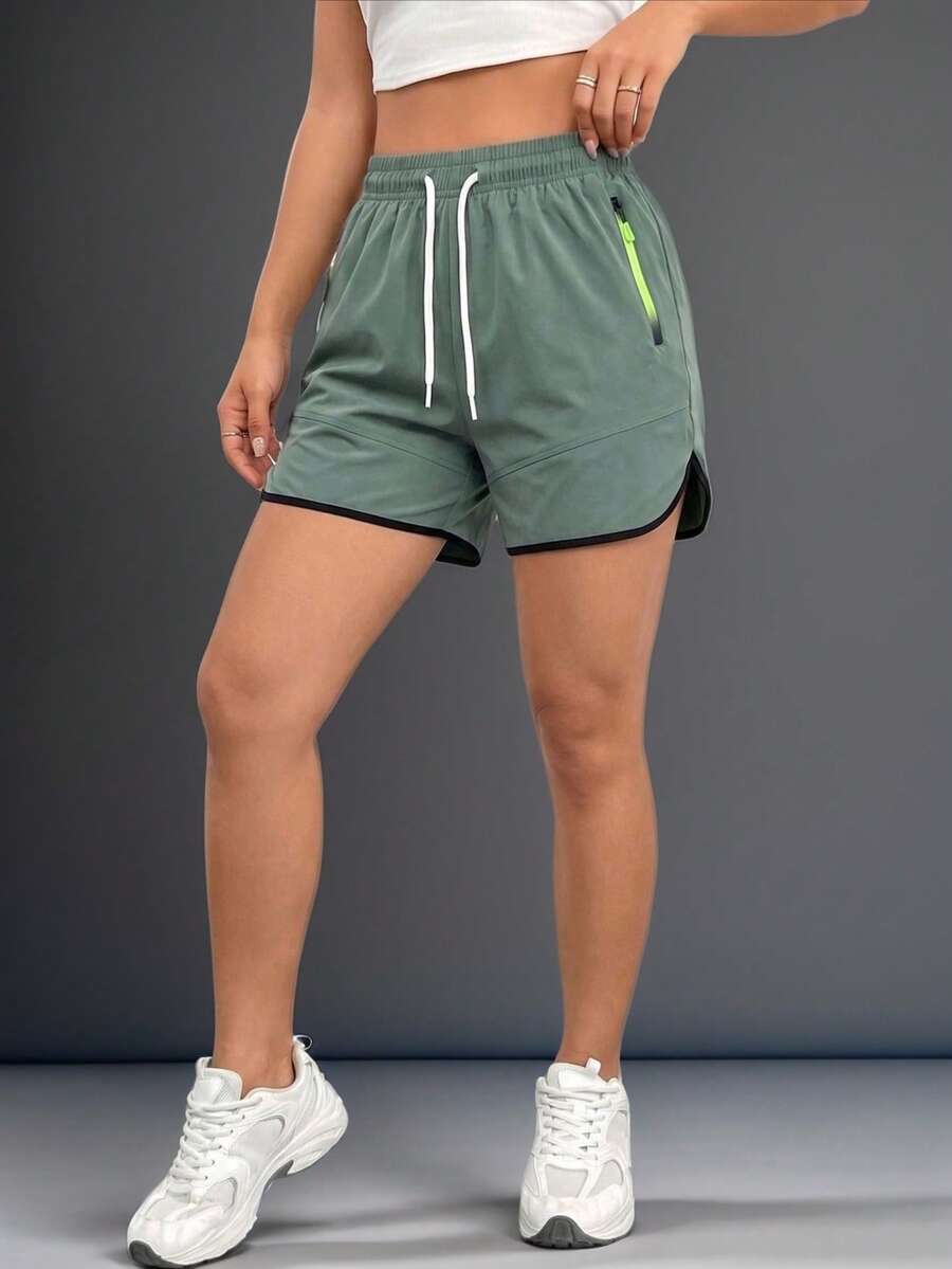 Quần short thể thao nữ màu trơn, quần chạy bộ nhẹ 5 inch dành cho nữ, có túi khóa kéo, kiểu dáng tối giản thời trang, dáng rộng, phù hợp cho hoạt động thể dục ngoài trời hàng ngày, chạy bộ, mặc thường ngày mùa hè. - màu xanh lá - Xem 1