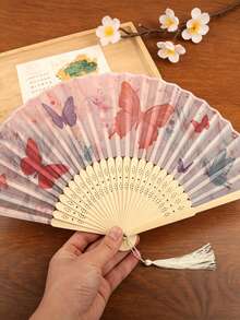 1把中国风蝴蝶折扇，水彩水墨画风格，空灵飘逸，优雅的蝴蝶图案，开合顺畅，易于收纳，搭配精致白色流苏，清爽宜人，适合夏季使用，百搭汉服、新款中国风服饰、摄影、日常通勤等场合，兼具美观与品质，是文艺青年女性的必备配饰。 - 水墨蝴蝶扇子 - 查看 5