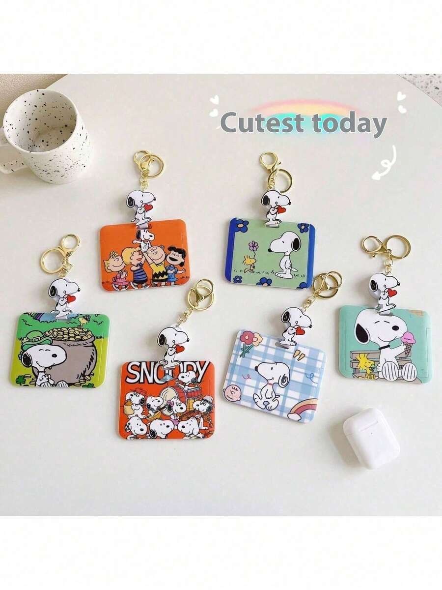 SNOOPY 主題多功能卡夾鑰匙圈,附生動卡通圖案,多色可選(奶油色與撞色)。硬質材質耐壓耐衝擊。整合身分證卡槽、公車卡槽與鑰匙圈,適合學生宿舍、通勤與辦公室使用。適合作為聖誕禮物與情侶小禮,實用且多功能。 - 彩色 - 查看 1