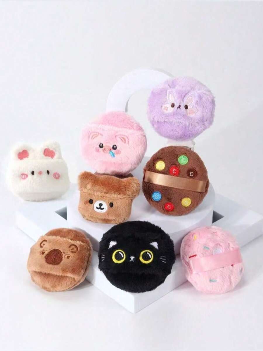 可愛動物刺繡粉撲,輕輕將粉撲壓在臉上定妝。使用粉撲邊緣或尖端處理鼻翼和眼角等細節,確保妝容均勻。 - 彩色 - 查看 1