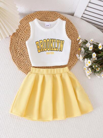 Conjunto de 2 piezas de verano para niñas bebé, con parte superior tipo chaleco con estampado de letras al estilo universitario y falda recta de unicolor