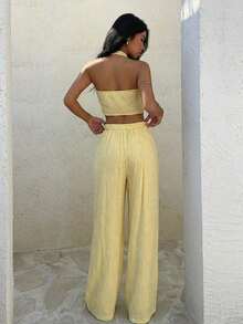 Conjunto elegante de lino para mujer conjunto para vacaciones playa y eventos conjunto dos piezas con top de cuello caído y pantalones holgados color amarillo estilo bohemio apto para festivales bodas y salidas informales - Celeste - Ver 10