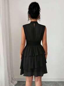 Vestido corto italiano de mujer de gasa con cuello pequeño, cintura recogida, volantes en el bajo y sin mangas, para uso casual, viajes, tardes de té, en colores lisos, para primavera/verano - Verde - Ver 10