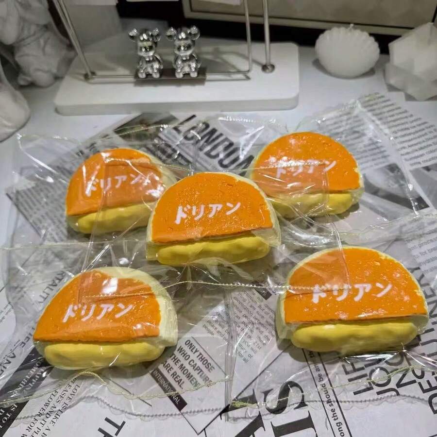 1 pieza Juguete de apretón de silicona, relleno de durian de carbón que se recupera lentamente, juguete antiestrés de apretón