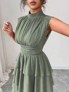 Vestido corto italiano de mujer de gasa con cuello pequeño, cintura recogida, volantes en el bajo y sin mangas, para uso casual, viajes, tardes de té, en colores lisos, para primavera/verano - Verde - Ver 4