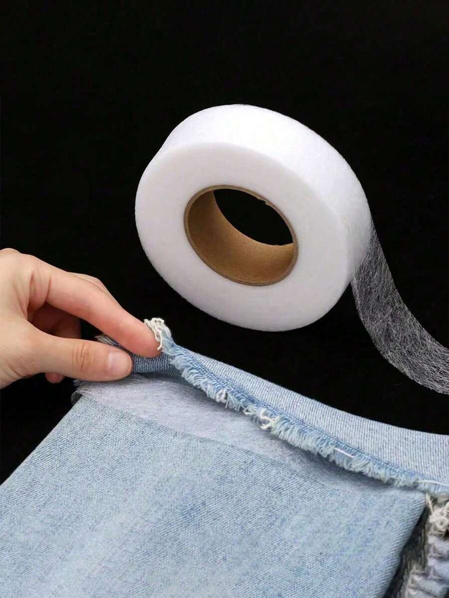 Băng keo sửa chữa quần áo hai mặt rộng 1,5cm, có khả năng dán chắc chắn, thích hợp cho quần áo, vải vóc và may vá.