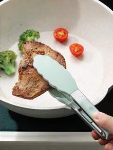 1个硅胶食物夹，经久耐用，耐热，多用途，易于清洁，不锈钢烹饪夹；适用于厨房烹饪、婚礼、夹取面包和水果；完美的厨房配件、烧烤工具和家居装饰。 - 三線夾 - View 2