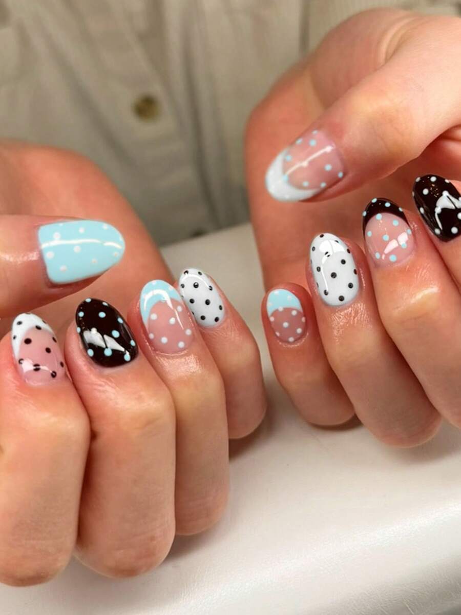 Bộ 30 móng giả ngắn hình bầu dục chấm bi, bao gồm 1 lọ sơn gel và 1 dũa móng, móng giả chấm bi ngắn giúp đầu ngón tay bạn tỏa sáng rực rỡ, phù hợp cho các bữa tiệc, khiêu vũ và sử dụng hàng ngày. - Nhiều màu - Xem 1