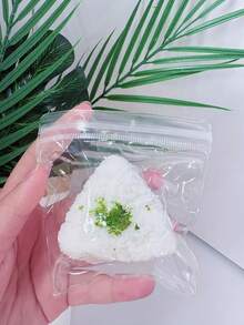 畅销芝麻三角饭团慢回弹软硅胶玩具，缓解压力，逼真饭团造型 - 彩色 - 查看 13