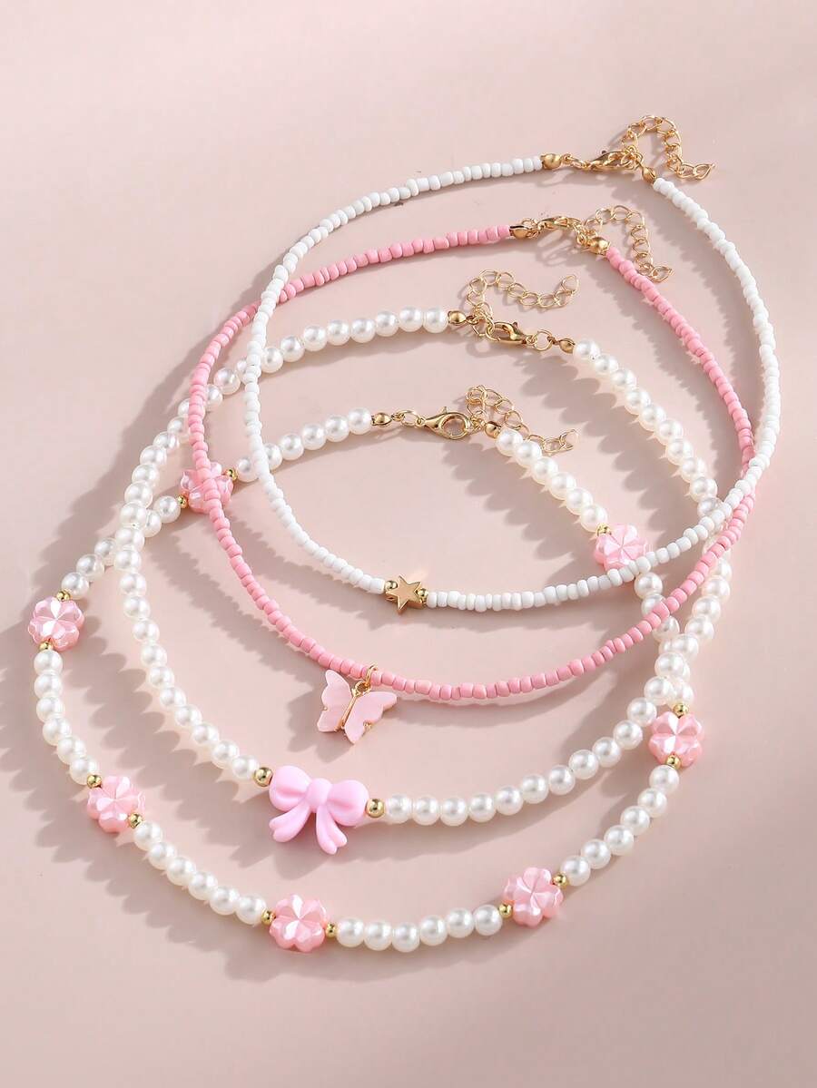 NAIZHU 4 Stücke modischer, süßer Perlenkette-Set mit Schleife, Blume, Herz, geeignet für Mädchen für Alltag, Urlaub, Party - Pink - Übersicht 1