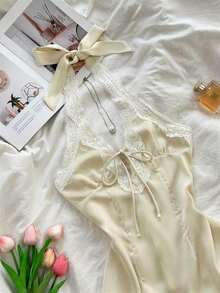 Vestido mini ajustado de línea A con escote en V profundo, sin mangas y espalda descubierta, de moda y casual, apto para primavera temprana, otoño e invierno. Adecuado para vacaciones, Día de San Valentín y citas - Negro - Ver 7