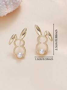 1 par de lindos pendientes de perlas huecas con forma de conejo, pendientes versátiles con un corazón lindo y juguetón de niña - Dorado - Ver 7