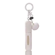 Một lọ nước hoa nhung mềm mại di động mới với móc khóa rất nữ tính, bao gồm một lọ dung dịch thay thế 5ml, vật dụng cần thiết hoàn hảo khi đi du lịch dành cho phụ nữ. - Móc khóa chai nước hoa mini 5ml - Xem 20