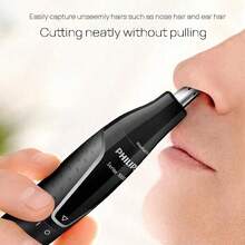 PHILIPS Electric Nose And Ear Hair Trimmer. 360° Rotating Blade For Fast, Powerful Trimming Without Pulling. Textured Handle For A Better Grip. Fully Washable For Easy Cleaning. Rounded Blade That Won't Hurt Your Skin. NT1620 - Black - View 2