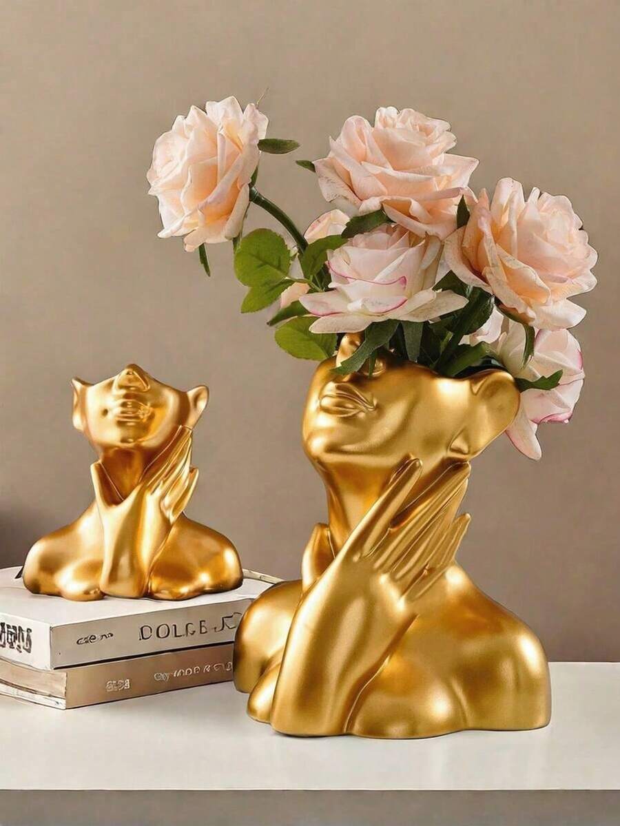 一件独特的艺术女性雕像花瓶，兼具装饰性和实用性，是家居装饰的必备之选。手托下巴的设计非常优雅，适合摆放在客厅、卧室、电视柜、桌面等处，是流行的房间装饰品和家居装饰礼品。