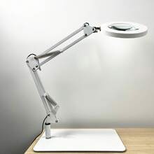 1 chiếc kính lúp 10X có đèn và chân đế, đèn lúp để bàn dùng nguồn USB, đèn bàn LED 2 trong 1 có thể điều chỉnh độ phóng đại, 3 chế độ ánh sáng 10 mức độ sáng, xoay 360°, thích hợp cho làm móng, làm đẹp, thêu thùa, đọc sách, thủ công, sửa chữa, vẽ tranh. - Đèn bàn kính lúp 10x - Xem 3