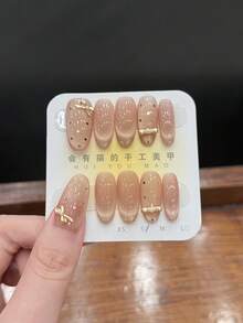 10片装纯手工制作美甲贴片套装，冰感裸色猫眼美甲贴片，奢华金属装饰蝴蝶结仿珍珠闪亮水钻法式边，轻薄舒适，适合工作、婚礼、伴娘等场合，超薄舒适，对指甲友好，可拆卸重复使用。 - 彩色 - 查看 1