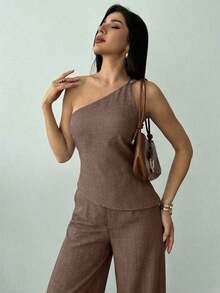 Conjunto dos piezas  2026 para mujer top asimétrico de hombro y pantalones holgados color verde oliva elegante ideal para uso diario y salidas - Camel - Ver 6