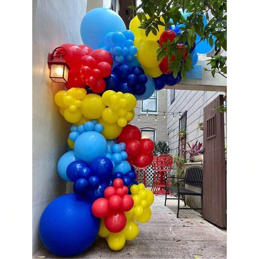Un conjunto de 130 guirnaldas de globos de látex rojos, amarillos y azules, adecuados para fiestas de bebés, decoraciones de fiestas de cumpleaños, etc., que incluyen varios globos. - Ver 1