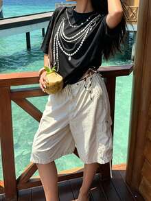T-shirt décontracté pour femmes à col rond et manches courtes, Top d'été ample avec imprimé unique de chaîne de perles. Convient pour les vacances à la plage et le port quotidien - Noir - Voir 9