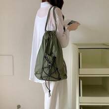 男女兼用の大容量軽量ナイロン製巾着バックパック。ハイキング、カジュアル、その他様々な用途に適しています。 - アーミーグリーン - チェックする 2