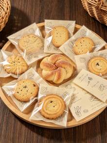 50pcs Cookie & Bread Gift Bags, Self-Adhesive Packaging Bags Printed With Cartoon Bread & Dessert Patterns, DIY Party Gift Packaging Boxes, Snacks & Candy Decor, Suitable For Party Gifts And Souvenirs, Graduation Party Decorations, Cookie & Candy DIY Decor Bags, Afternoon Tea Packaging - Type B - View 3