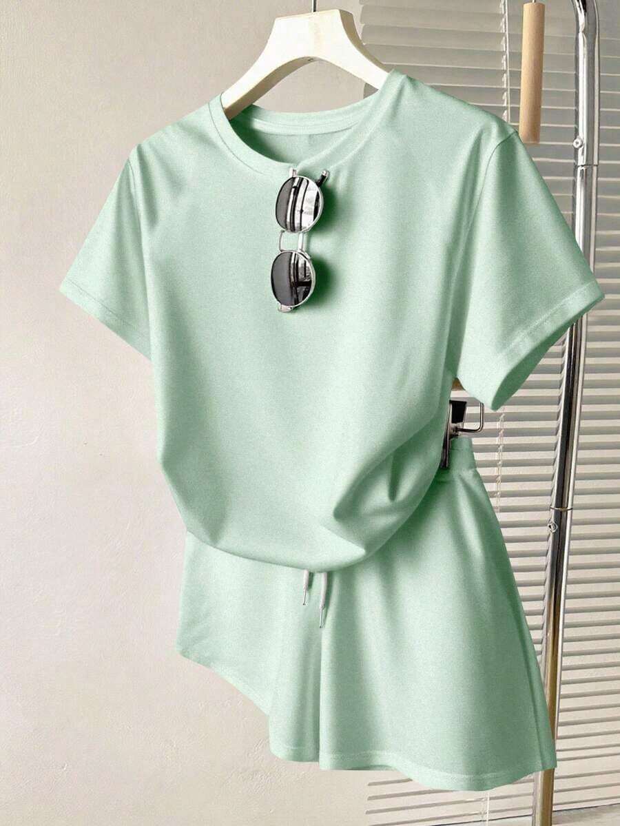 Conjunto de dos piezas casual 2026: camiseta cuello redondo + shorts con cordón color café, ideal para verano - verde menta - Ver 1
