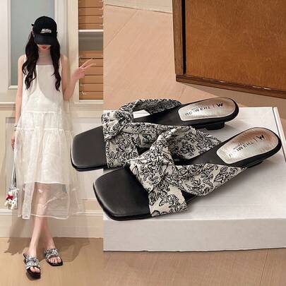 Giày sandal đế xuồng quai chéo kiểu Pháp mùa hè 2026 mới, giày búp bê phối cùng váy, sandal đế bằng độc đáo.