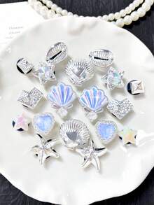 Bộ 18 món phụ kiện trang trí giày chủ đề Đại dương bạc, bao gồm vỏ sò, sao biển, ốc xà cừ nhỏ, bộ phụ kiện tự làm, thích hợp cho giày đục lỗ, hoa trang trí giày, phụ kiện trang trí giày tự làm thời trang. - Bạc - Xem 7
