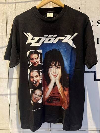 2026 Nueva Camiseta Retro Vintage RONGCD Bjork 1990S Tour - Camiseta Unisex Negra con el Icónico Logotipo de la Gira Musical, Diseñada para un Ajuste Relajado con Ligera Elasticidad, Adecuada Tanto para Hombres como para Mujeres, Perfecta para Uso Casual en Todas las Temporadas.