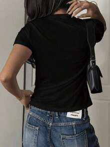 Camiseta de mujer de manga corta con cuello redondo, holgada, casual y versátil.Con estampado moderno, elegante y sofisticado de letras simples, ideal como prenda básica; confeccionada en tela suave con excelente caída - Negro - Ver 3
