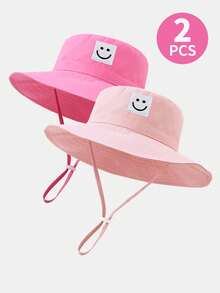 2 piezas Sombrero de cubo de protección solar de verano para niños con parche de cara sonriente de unicolor y correa para la barbilla - Rosa claro + rojo rosado (parche con carita sonriente) - Ver 7