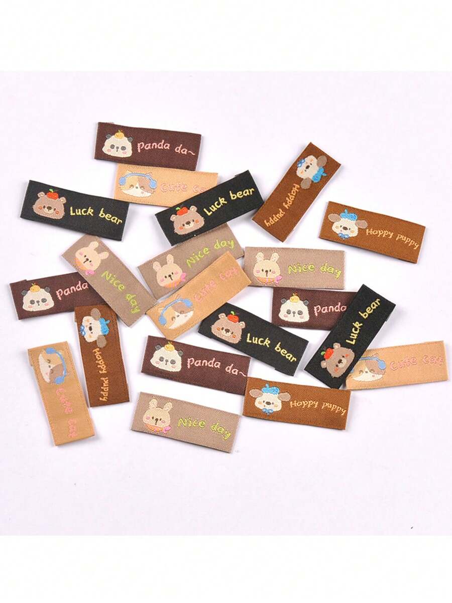 50 piezas de 40x17mm Etiquetas rectangulares minimalistas negras y de color café con patrones bordados de perro/panda/gato/conejo, adecuadas para ropa, mochilas, decoraciones de costura y materiales de manualidades - Multicolor - Ver 1