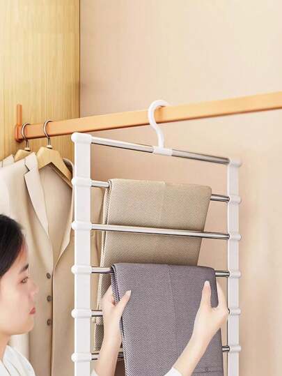 1 chiếc móc treo quần nhiều tầng, bằng thép không gỉ, tiết kiệm không gian, giá treo quần gấp gọn chống trượt cho quần tây, quần jean và khăn quàng cổ, chịu lực cao, lưu trữ theo chiều dọc.