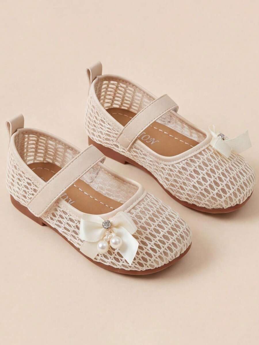 Giày sandal Mary Jane màu be có khóa dán điều chỉnh được cho bé gái 3-12 tuổi, điểm nhấn là nơ lưới màu kem, kiểu dáng mềm mại, phù hợp cho tiệc tùng và đám cưới. - Màu be - Xem 1