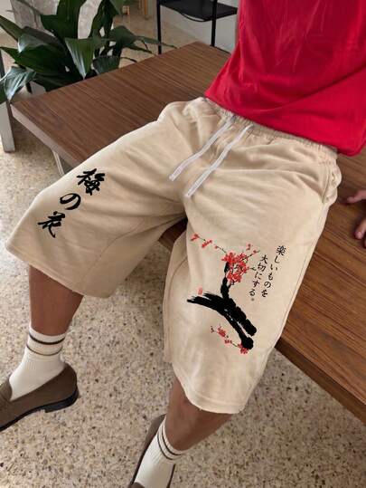  FRACTYR 男士夏季休闲街头时尚宽松直筒七分裤 - 破洞裤脚设计，饰以花卉图案，舒适运动裤