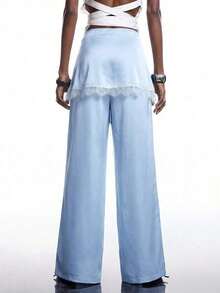 Pantalones holgados de verano color azul claro, con detalles de encaje y volante en la cintura.Un diseño único y versátil para looks de oficina, casuales y de fiesta. - Negro - Ver 10