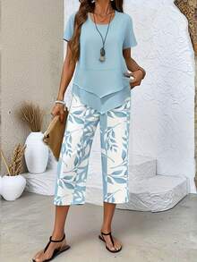 2026 New Women Casual 2-Piece Outfit, Solid Irregular Hem Short Sleeve Top & Plant Print Capri Pants, Loose Soft Loungewear, Ideal Travel Beach Daily - Light Blue - View 2