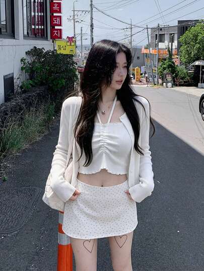Bộ đồ hai mảnh dệt kim dài tay mùa xuân hè mới dành cho nữ, cổ trễ, lưng đẹp, áo hai dây, dáng ôm gợi cảm.